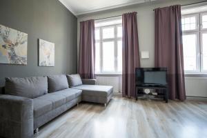Televízia a/alebo spoločenská miestnosť v ubytovaní Brand new renovated appartment near Augarten
