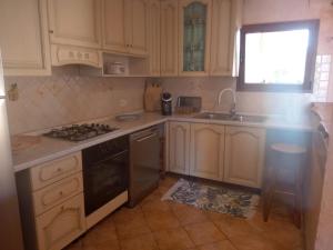 Η κουζίνα ή μικρή κουζίνα στο casa vacanza Rosanna
