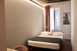 Letto o letti in una camera di Coco21