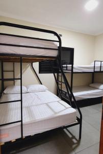Двох'ярусне ліжко або двоярусні ліжка в номері Casa em Brotas