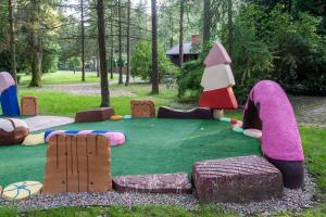 Ogród w obiekcie Apartamenty wśród drzew River Park