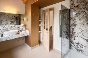 Koupelna v ubytování Dolomit Boutique Hotel