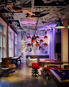 a room with a ping pong table and pool tables at Hotel Zeppelin San Francisco in San Francisco +31 photos