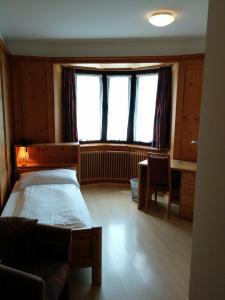 Voodi või voodid majutusasutuse Hotel Terminus toas