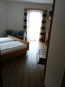 Voodi või voodid majutusasutuse Hotel Terminus toas