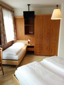 Voodi või voodid majutusasutuse Hotel Terminus toas