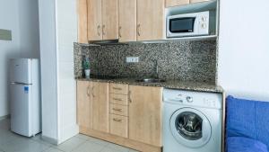 Kuchyňa alebo kuchynka v ubytovaní APARTAMENTO SIMO B/G
