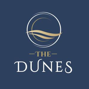 a logo for the dunhases basketball team at The Dunes in Tenby