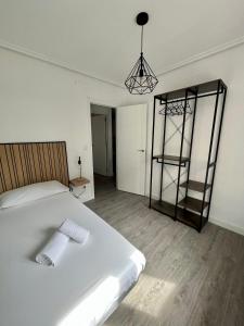 Postel nebo postele na pokoji v ubytování En el corazón de Santander