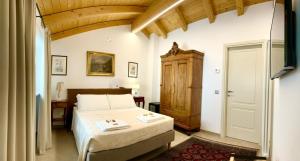 Postel nebo postele na pokoji v ubytování Casa Marchisio