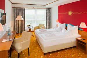 Postel nebo postele na pokoji v ubytování ACHAT Hotel Frankfurt Maintal + 37 fotografií