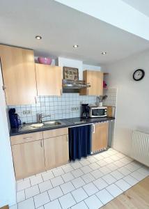 Kuchyň nebo kuchyňský kout v ubytování Villa Vivien Wohnung Findling
