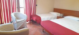 Posteľ alebo postele v izbe v ubytovaní Hotel Ceretto