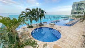 a large swimming pool on top of a building at Estelar Cartagena de Indias Hotel y Centro de Convenciones in Cartagena de Indias