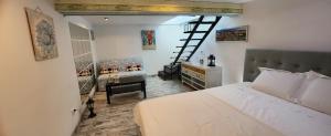a bedroom with a bed and a staircase in a room at Morii Lake Private Pool Villa in Bucharest +102 photos