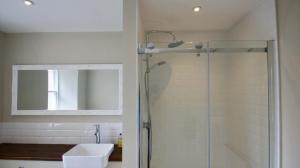 a bathroom with a shower and a sink and a mirror at Ruchearn in Comrie +25 photos