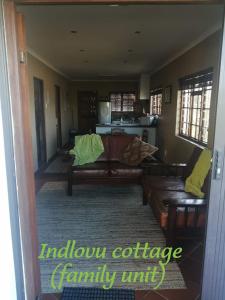 a living room with a couch and a table at Nukakamma Guest House in Colchester