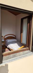 Una cama o camas en una habitación de Corte Toffoletti