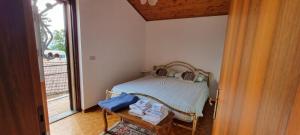 Una cama o camas en una habitación de Corte Toffoletti
