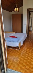 Una cama o camas en una habitación de Corte Toffoletti