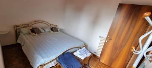 Una cama o camas en una habitación de Corte Toffoletti