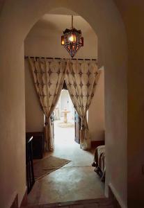 Letto o letti in una camera di Riad Le Coq Berbère