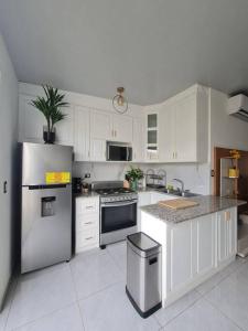 Dapur atau dapur kecil di Casa familiar