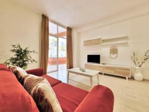 TV a/nebo společenská místnost v ubytování Martiánez Downtown