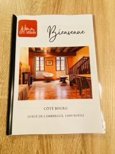a book with a picture of a house at GITE URBAIN - Côté bourg in Rodez