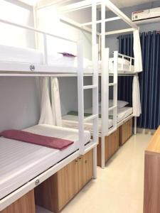 Postel nebo postele na pokoji v ubytování Amy 2 Hostel Hue