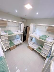 Postel nebo postele na pokoji v ubytování Amy 2 Hostel Hue