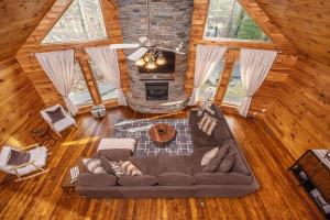 an overhead view of a living room with a couch and a fireplace at Horizon Shine in McHenry