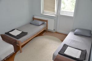 Postel nebo postele na pokoji v ubytování Center House Hostel