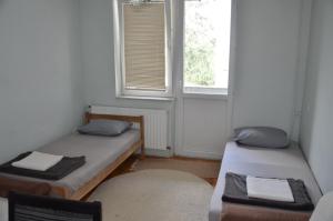 Postel nebo postele na pokoji v ubytování Center House Hostel
