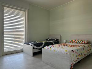 Postel nebo postele na pokoji v ubytování white B&B