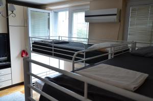 Postel nebo postele na pokoji v ubytování Center House Hostel