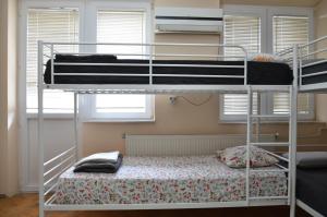 Postel nebo postele na pokoji v ubytování Center House Hostel