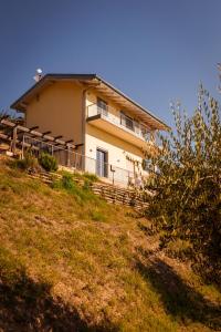 a house on the side of a hill at Borgo San Rocco Piemonte in Castino