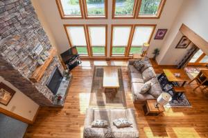 an overhead view of a living room with a fireplace at Mountain Top Lodge in McHenry +53 photos