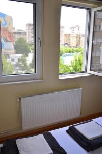 Postel nebo postele na pokoji v ubytování Center House Hostel