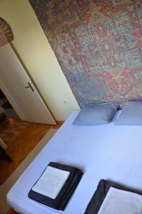 Postel nebo postele na pokoji v ubytování Center House Hostel