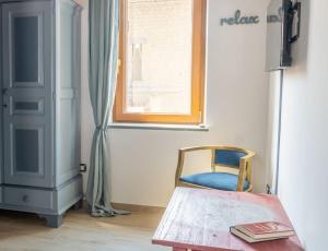 Postel nebo postele na pokoji v ubytování Palazzo NiTe