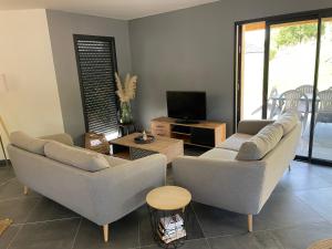 TV/trung tâm giải trí tại Maison cosy 130m2