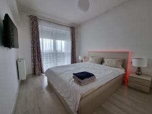 Ένα ή περισσότερα κρεβάτια σε δωμάτιο στο Modern Serenity Suite