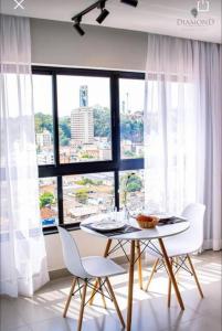 Balkón nebo terasa v ubytování Flat lindo com piscina e linda vista da cidade + 34 fotografií
