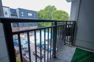 a balcony with a view of a swimming pool at COZY 1 bed/1 bath in Atlanta