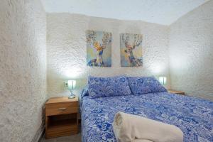 Posteľ alebo postele v izbe v ubytovaní Casa cueva El establo del Júcar