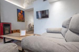 TV a/nebo společenská místnost v ubytování Casa rural el palomar del Júcar + 13 fotografií
