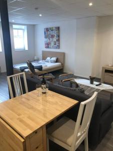 Posezení v ubytování Modernes 1-Zimmer-Apartment im Herzen Oberkochens
