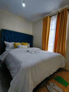 Postel nebo postele na pokoji v ubytování DANA HOMES + 15 fotografií